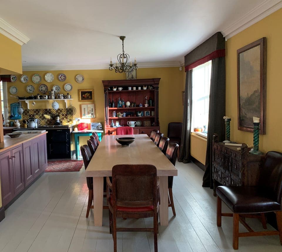 The dining table has seating for 12