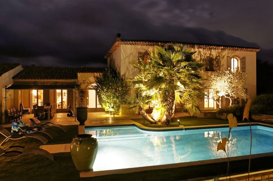 The pool illuminated at night