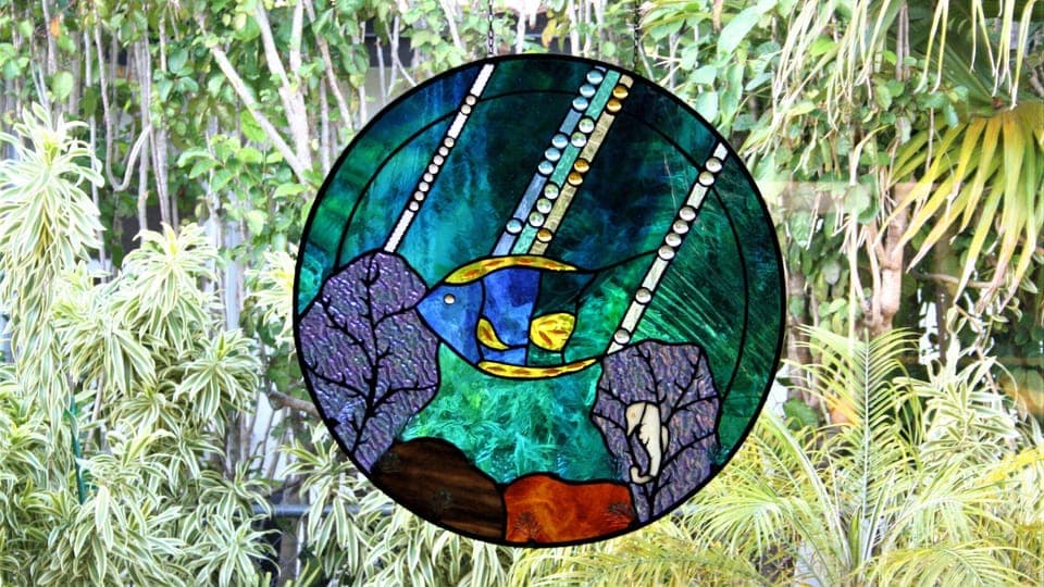 Stained glass art in living room by Smithsonian-chosen artist Julie Kelly