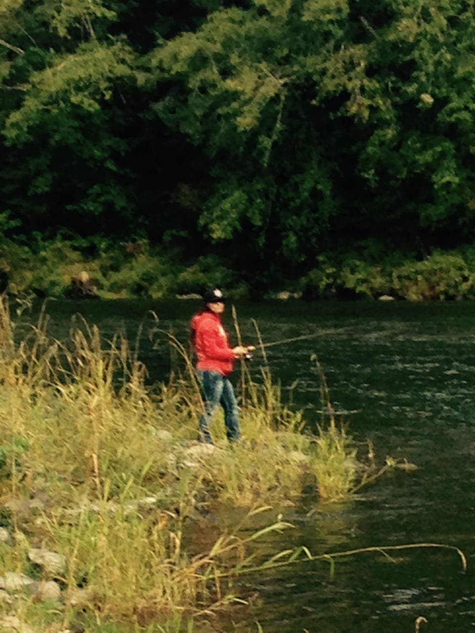 Our youngest girl trying out the fishing hole.