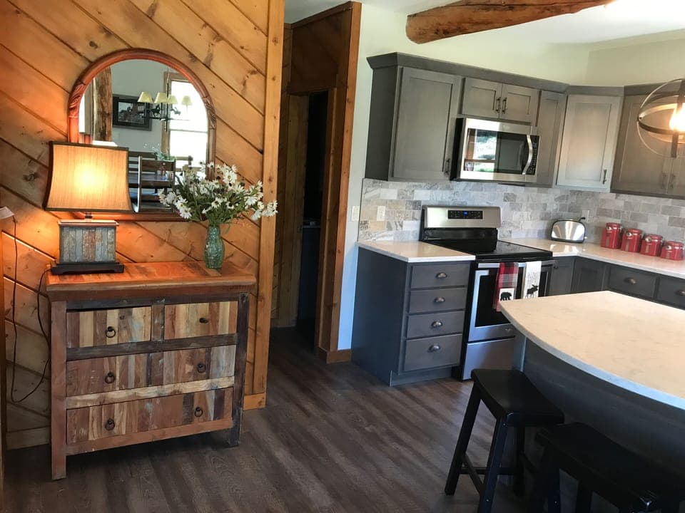 Kitchen and hall that leads to  main bath and laundry room.