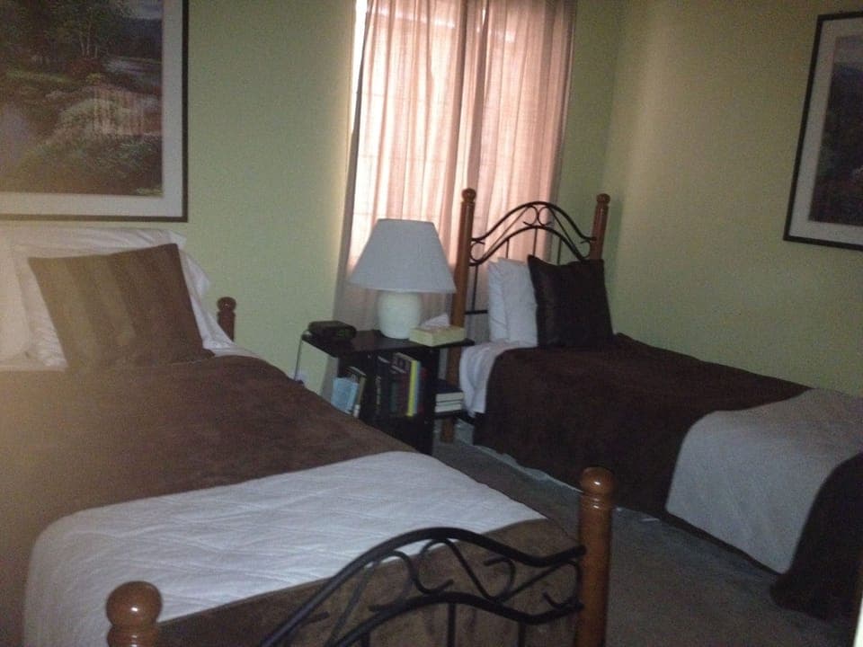 Second bedroom has twin beds and extra trundle