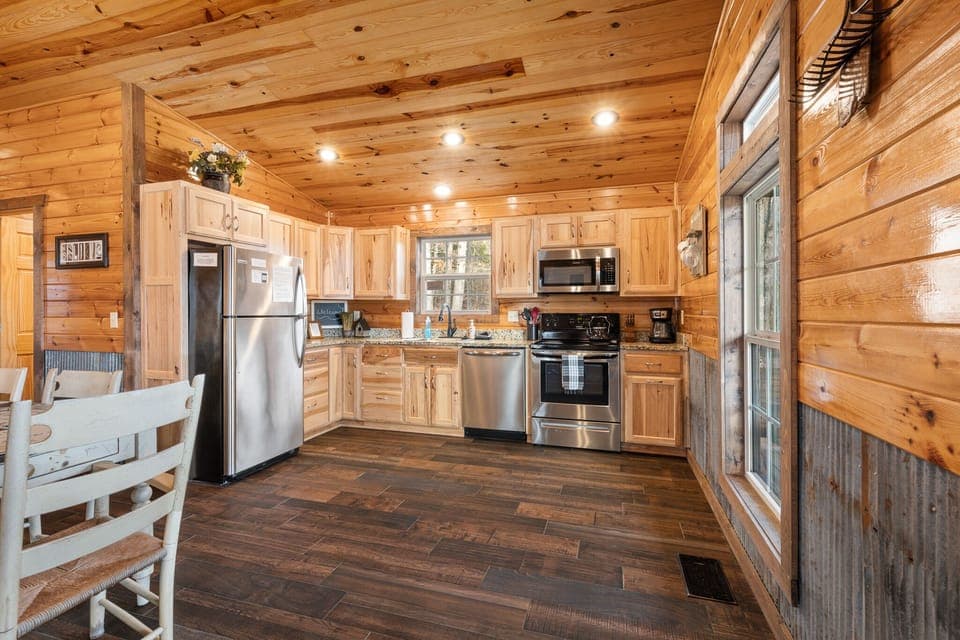 Fully stocked kitchen complete custom hickory cabinets and granite coutertops
