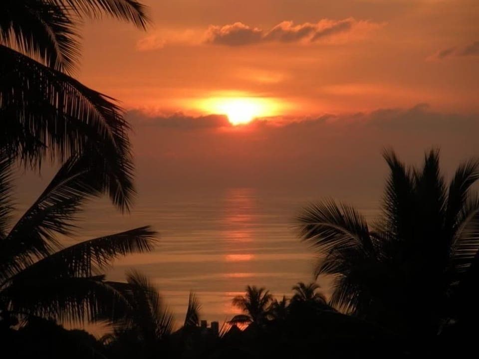 The sunset view from the "Bougainvillea" villa swimming pool!