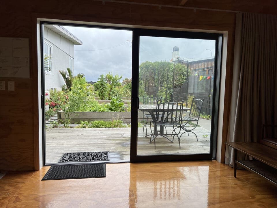 View of deck and vege gardens from sleepout