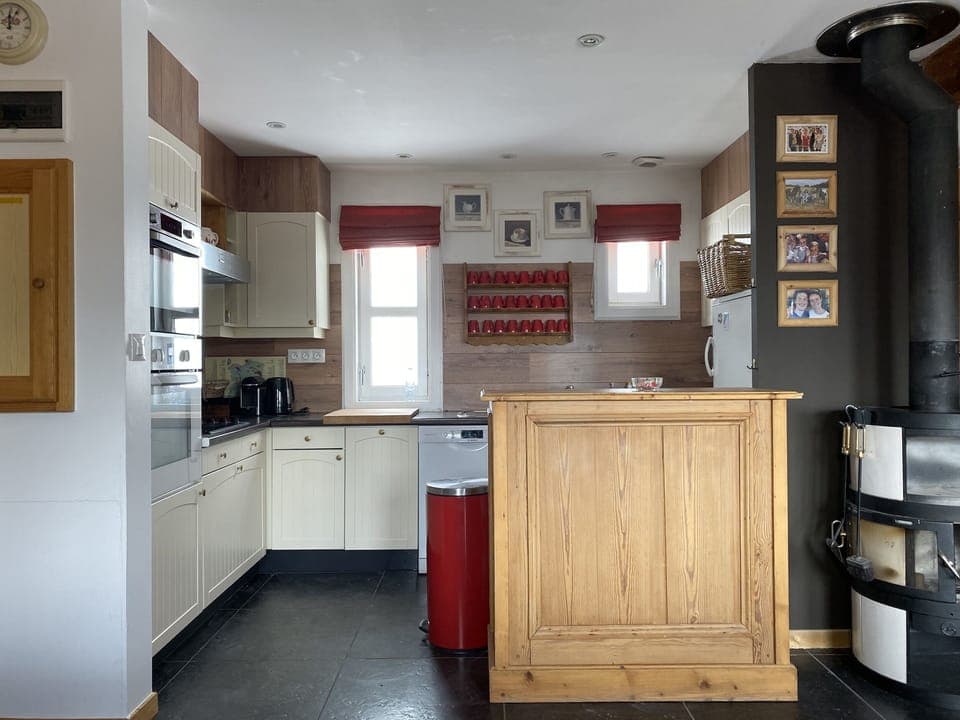 Kitchen with all appliances and utensils.