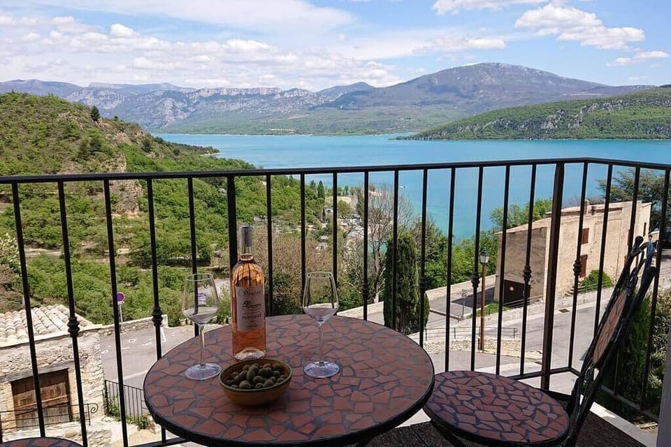 Balcony with stunning views of the lake and hills beyond