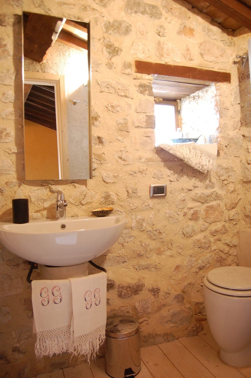 Full bath on middle floor has shower enclosure