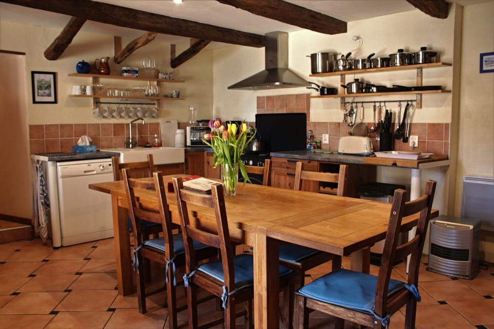 Spacious kitchen with dining table for 6