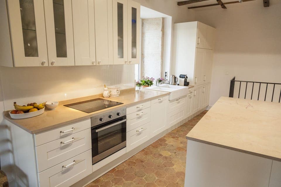 1st floor opens to generous kitchen, dining & living areas.