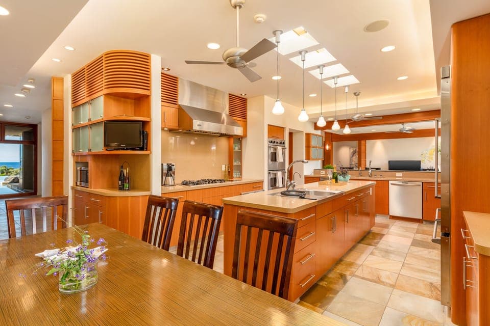 An open-concept gourmet kitchen designed for gathering and great conversation.