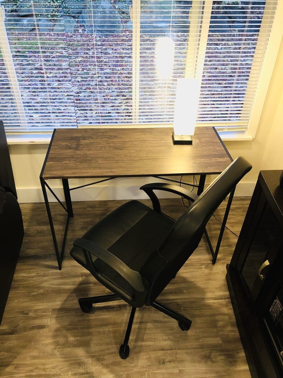 You’ll find a second desk next to the TV.