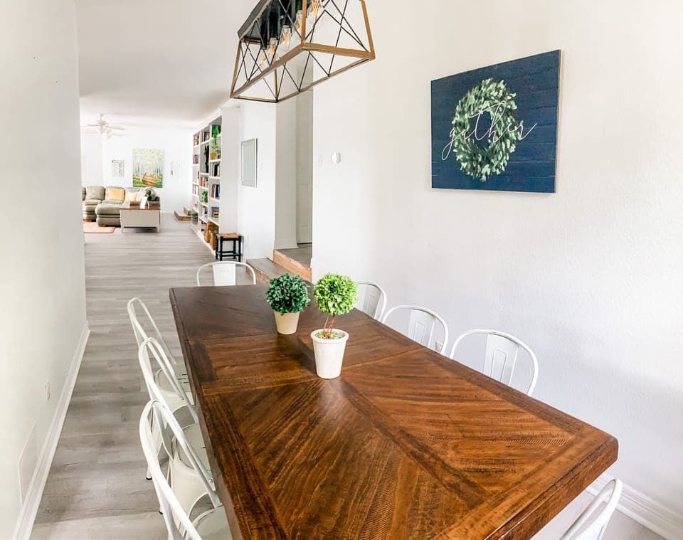 Dining room opens into second eating area and upstairs living room. 