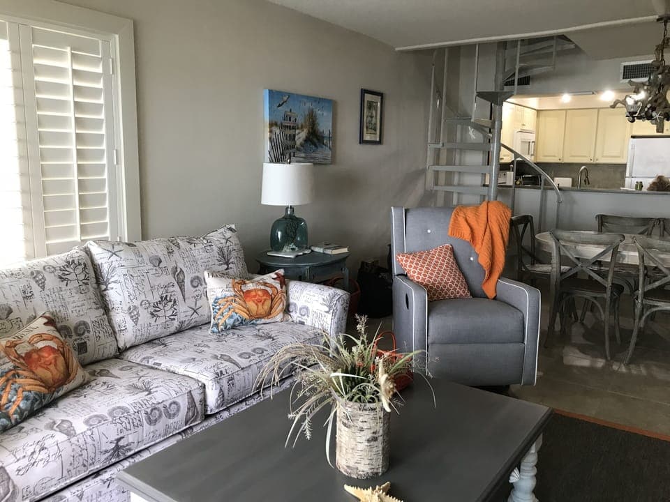 Newly redecorated living dining with queen sleeper. 