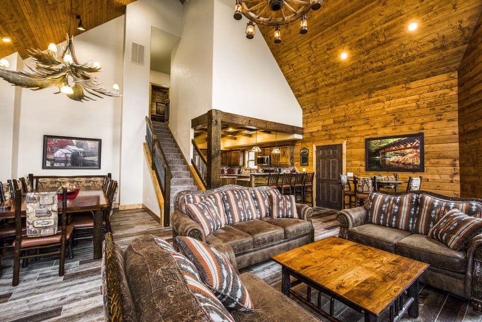 Spacious and comfortable living room with open floor plan to kitchen & dining