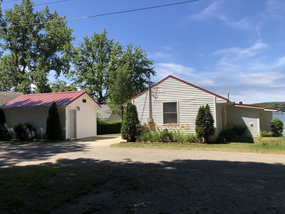 Front side of cottage on right & Casita bedroom & bath on left.
