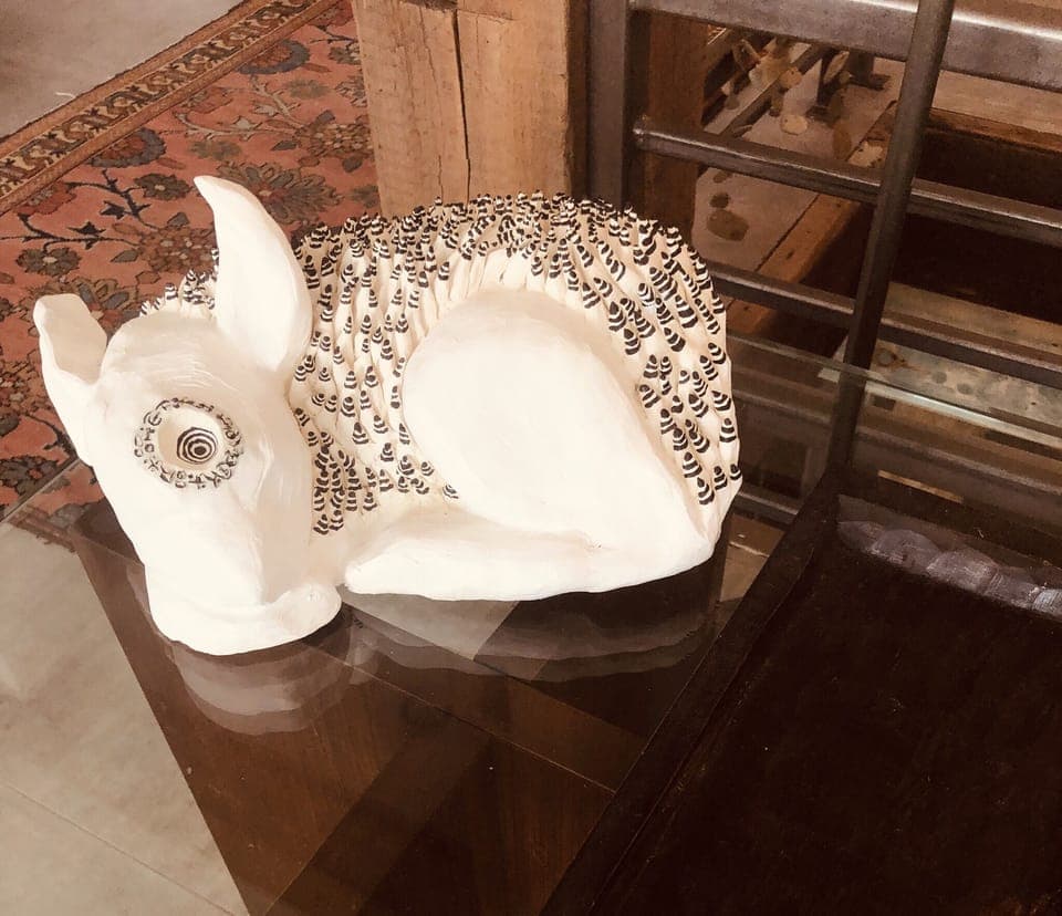 Original art and sculpture thoughout the home. 