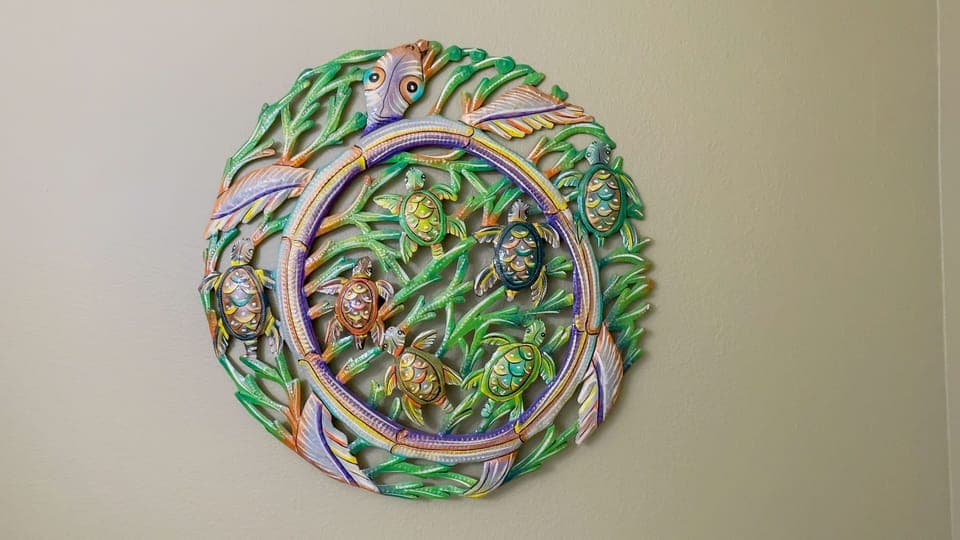 Unique tropical-themed wall art adds a colorful, local flair and ties in the natural beauty of the Big Island indoors.