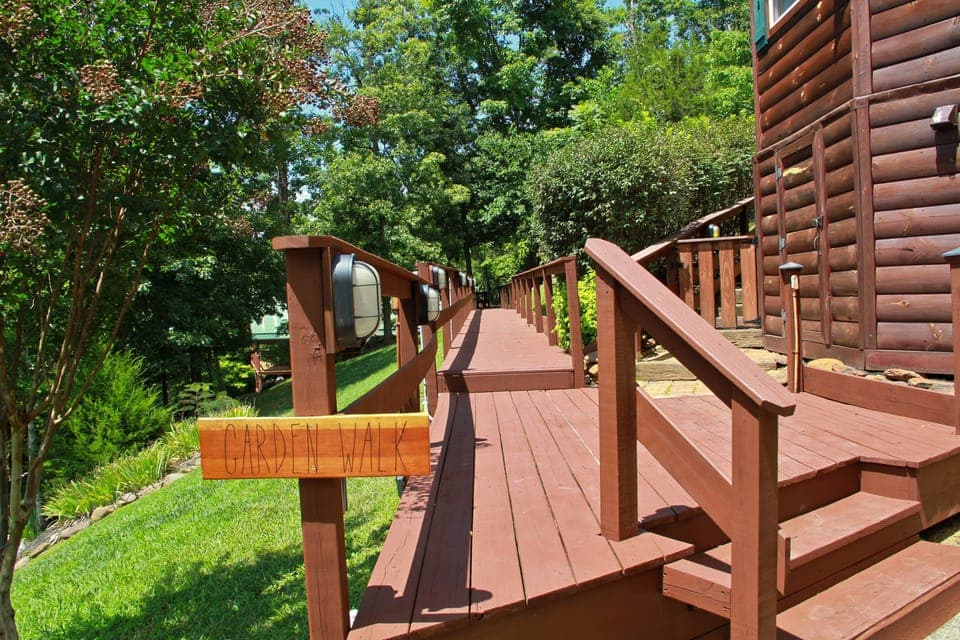 Boardwalk from the parking by the shared pool to the front door of Deer Lodge