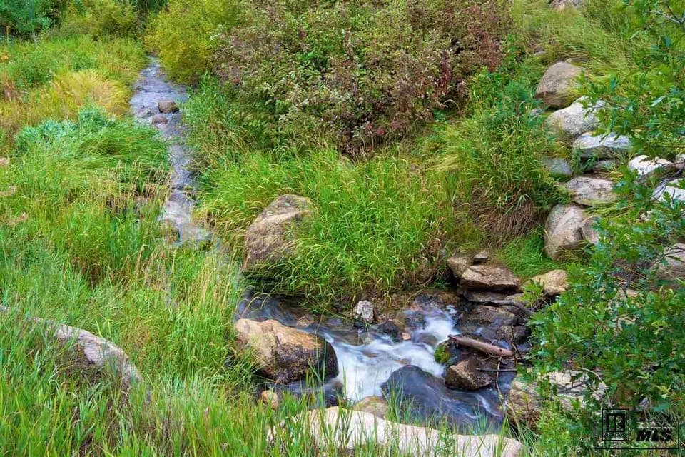 Listen to the sound of Burgess Creek from every window in the townhome