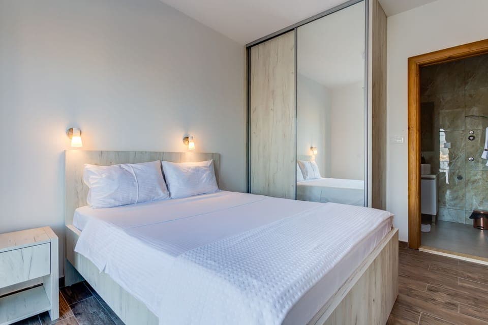 Bedroom provides closet as well big enough for all your clothes