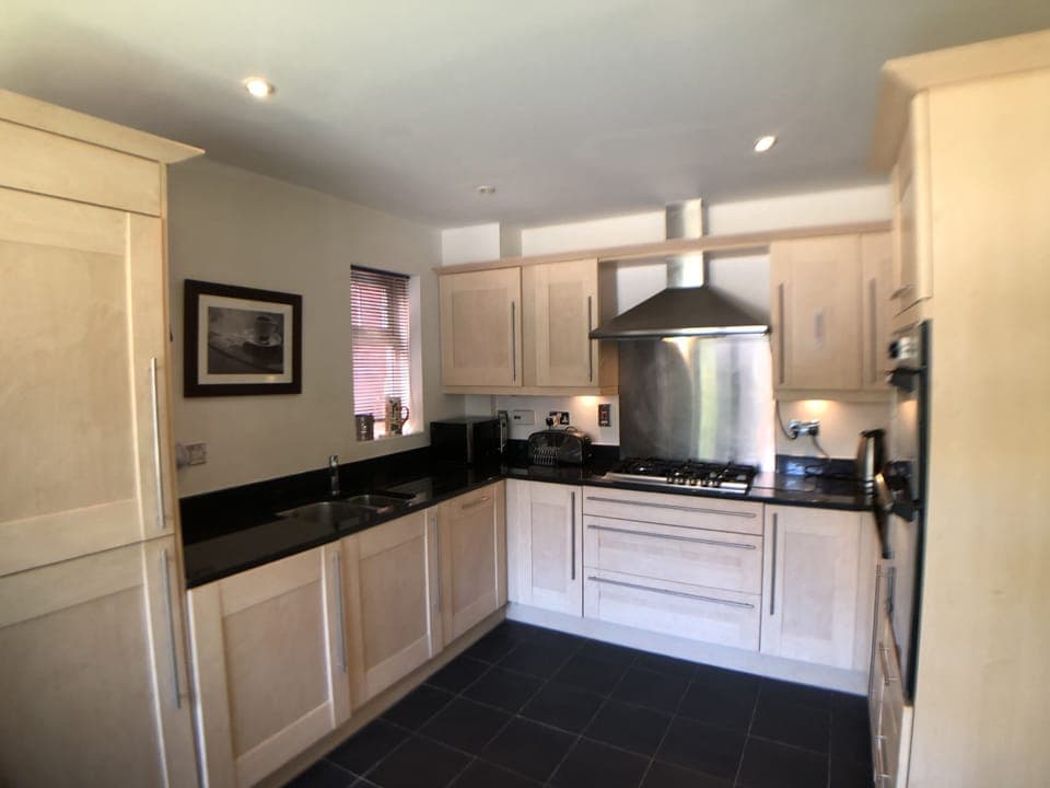 Kitchen view of integrated appliances