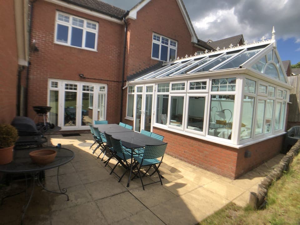 Patio with table and chairs to seat 10
