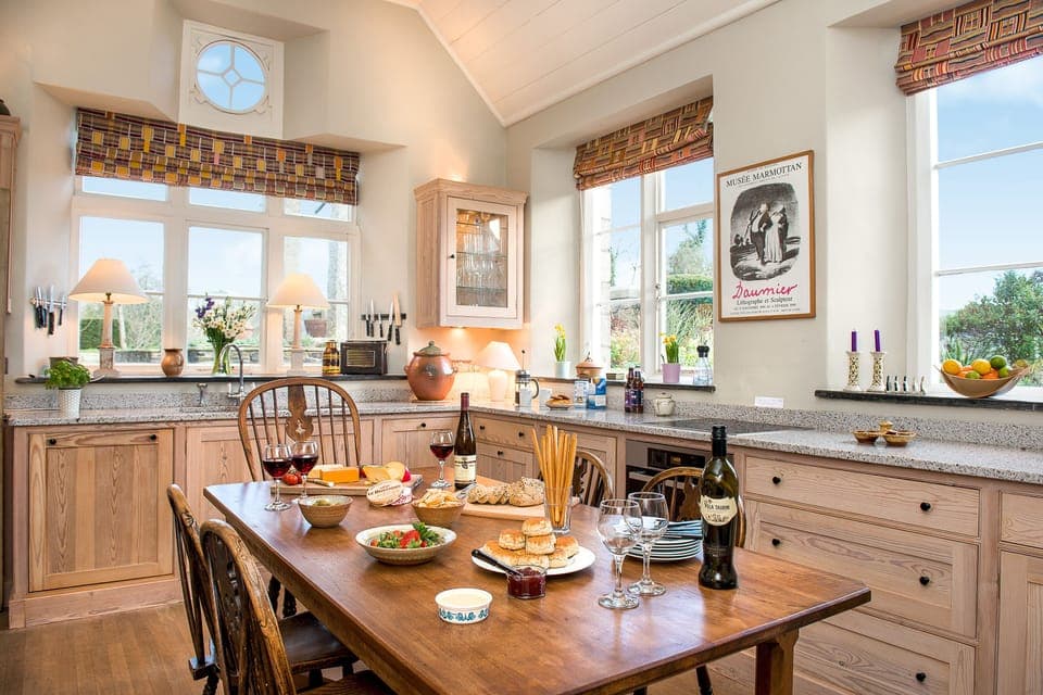 Inviting Kitchen at the heart of the house looking out over the valley
