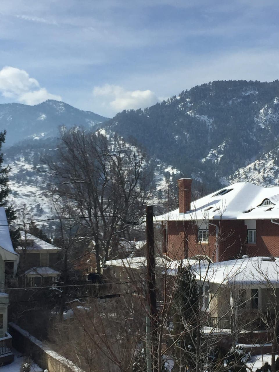 View of the Flatirons in winter