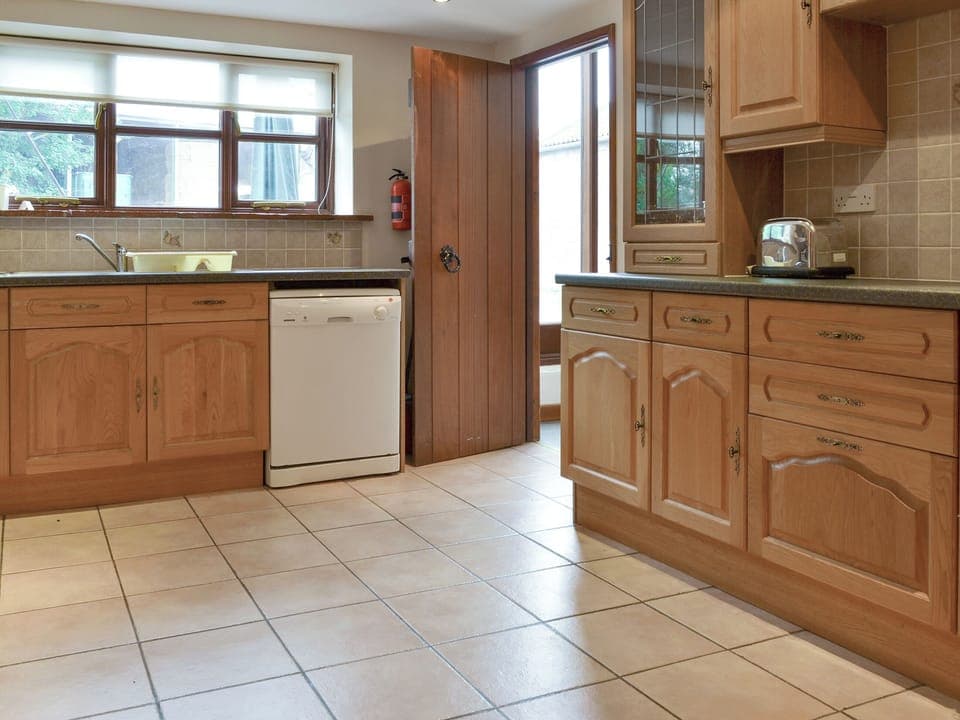 Well-equipped fitted kitchen | The Old Workshop - Moor Farm Stable Cottages, Foxley, near Fakenham