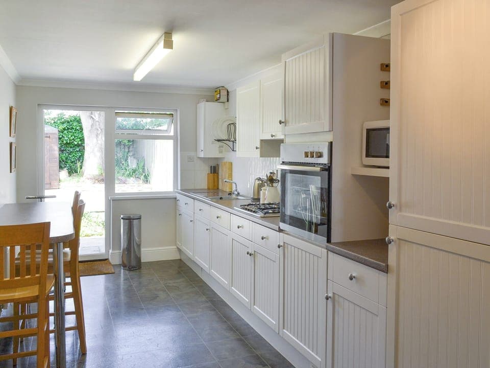 Well-appointed fitted kitchen with dining area | Number Five, St Minver, near Rock