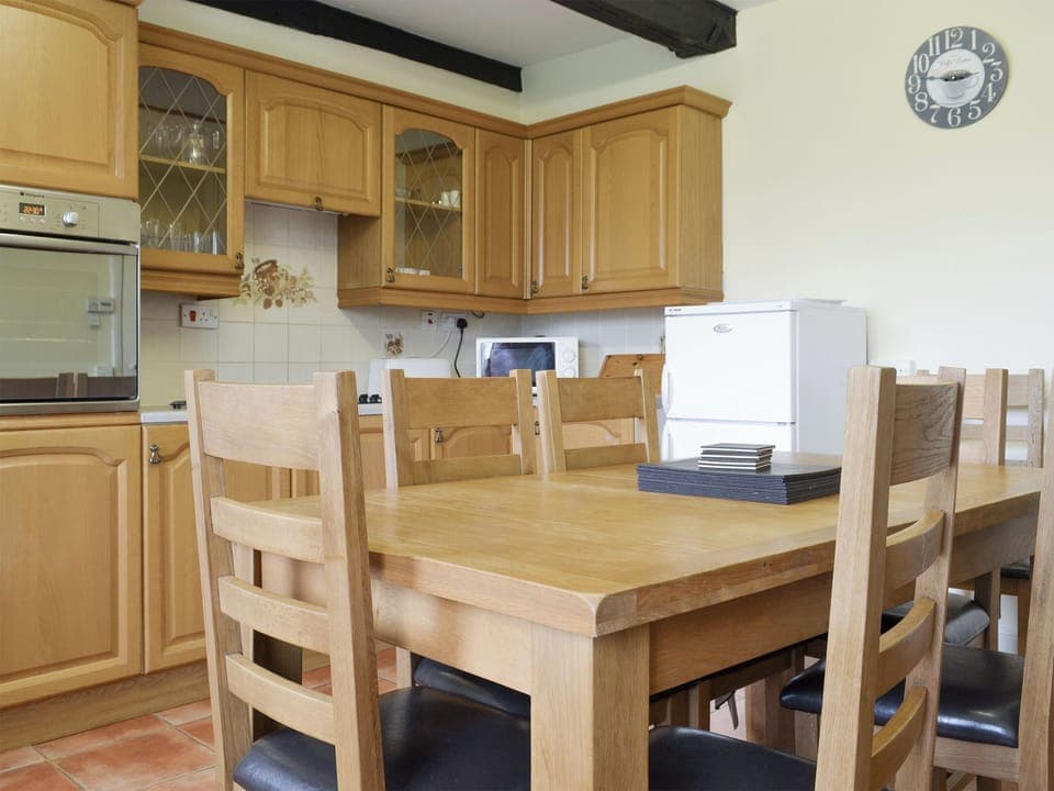 Convenient dining area within kitchen | Moor Farm Cottage - Moor Farm Stable Cottages, Foxley, near Fakenham