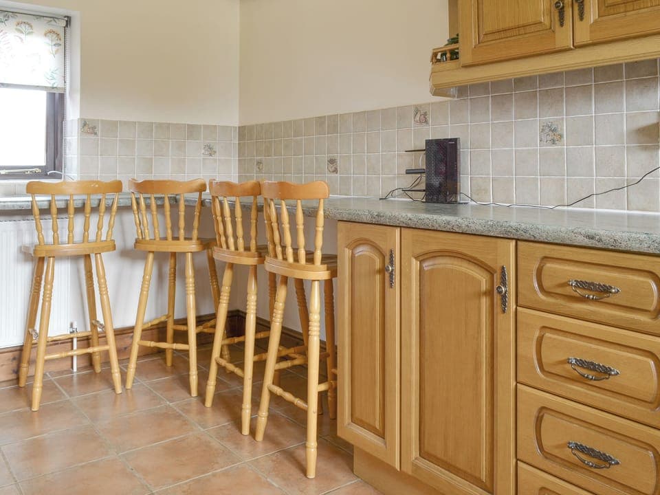 Informal dining area within kitchen | Baileys Barn - Moor Farm Stable Cottages, Foxley, near Fakenham