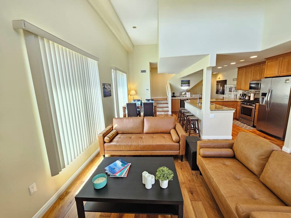 Sofas can comfortably seat 5 adults total.  Can hold up to 600lbs max each.  