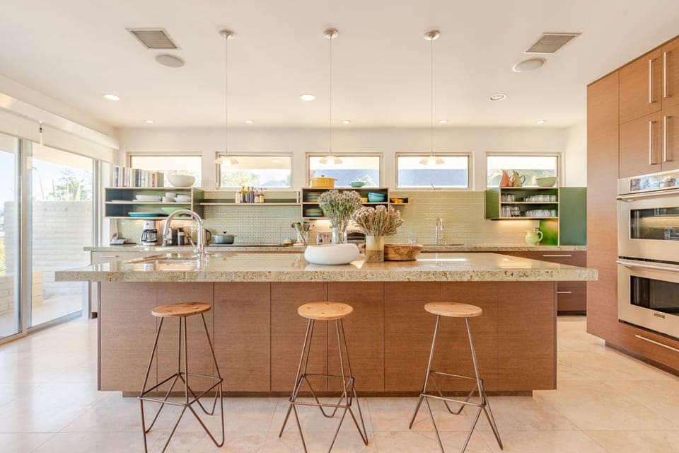 Kitchen and elegant stone island. 