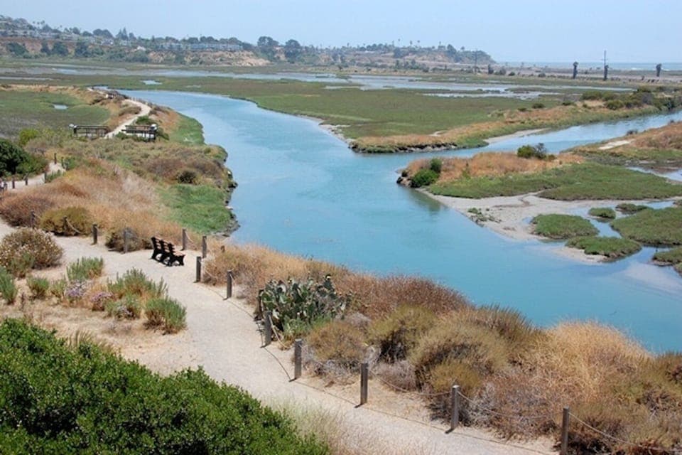 San Elijo Lagoon across the street. Wonderful to walk. 