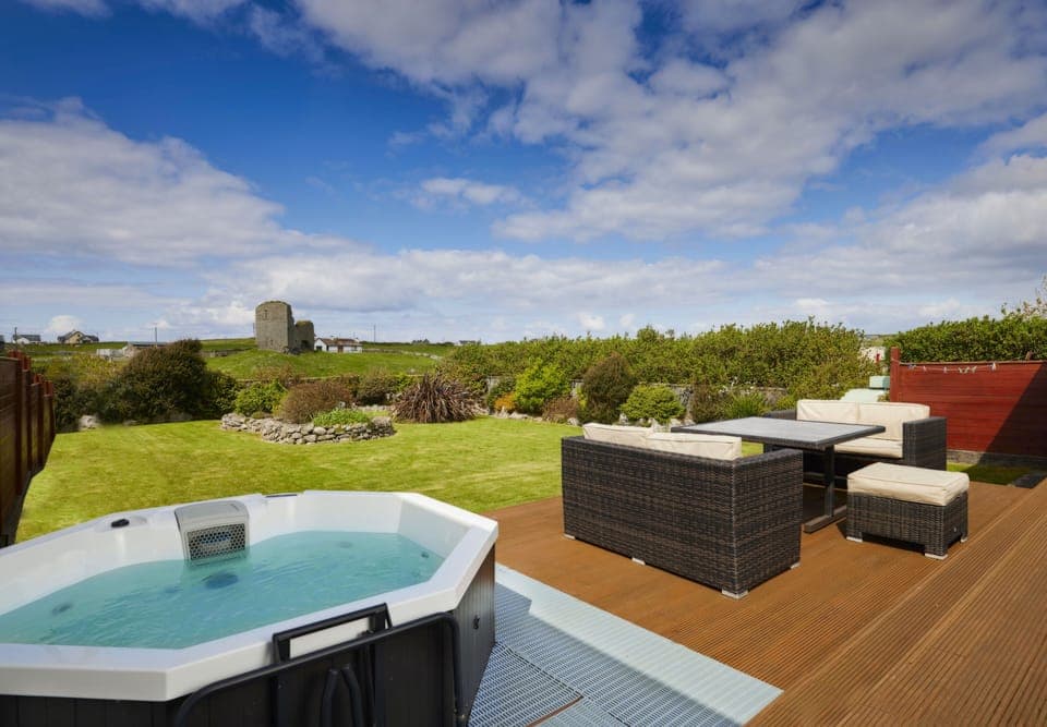 Deck with private hot tub and view of 500yr old castle