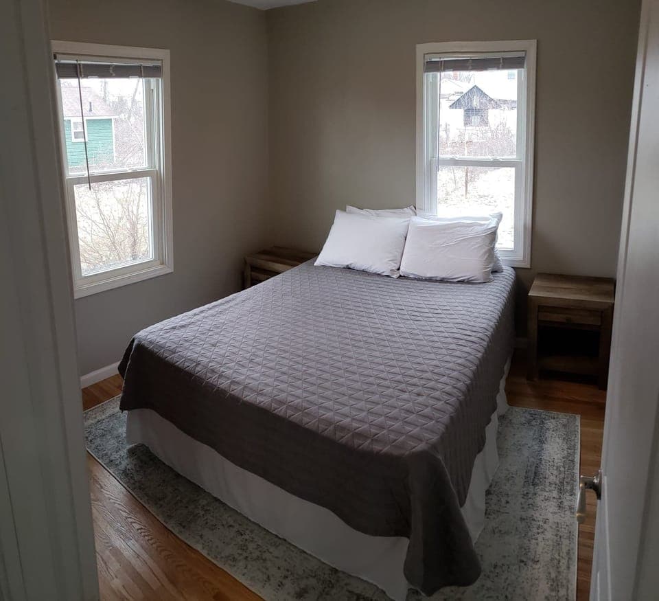 Our second bedroom also has a queen bed with a small safe in the closet.