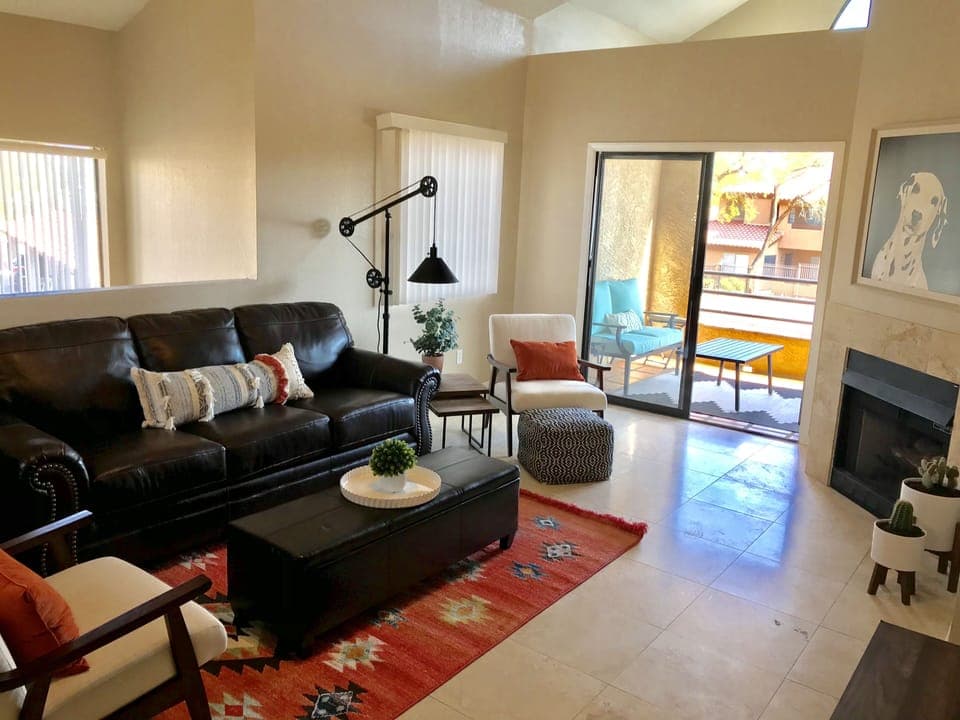 Sophisticated southwestern decor, queen sleeper sofa and wood burning fireplace.