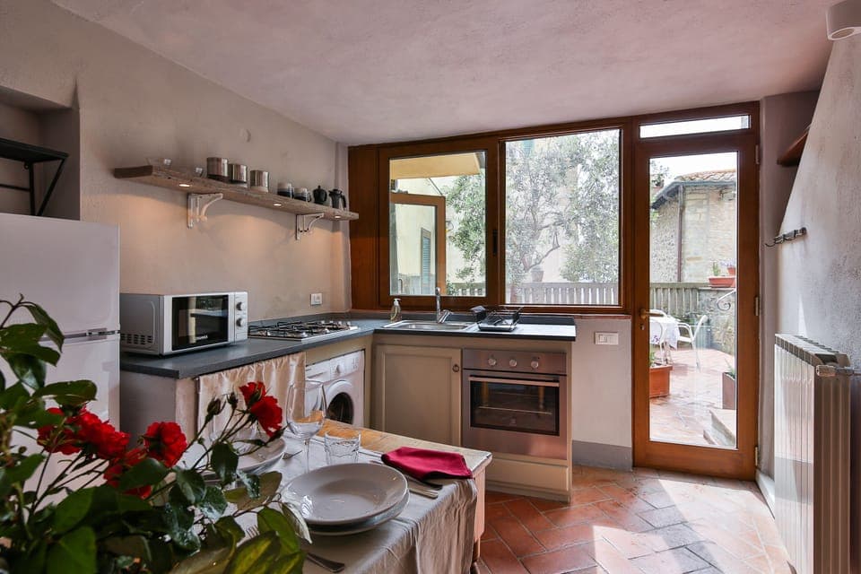 Enjoy preparing dinner with a view of the olive tree