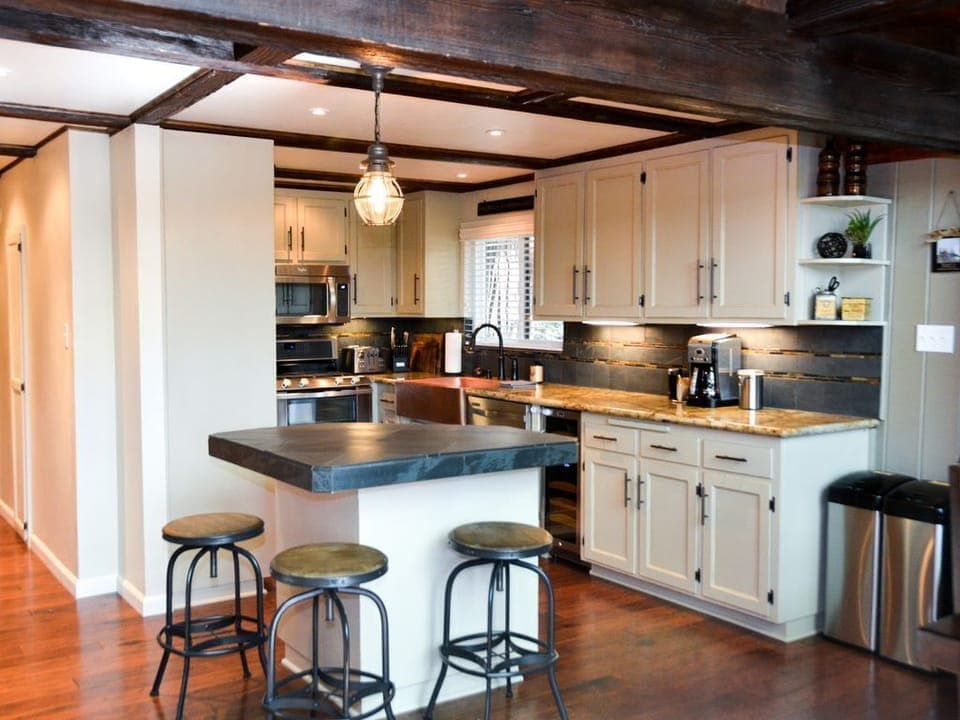 Gourmet kitchen with granite countertops and stainless steel appliances