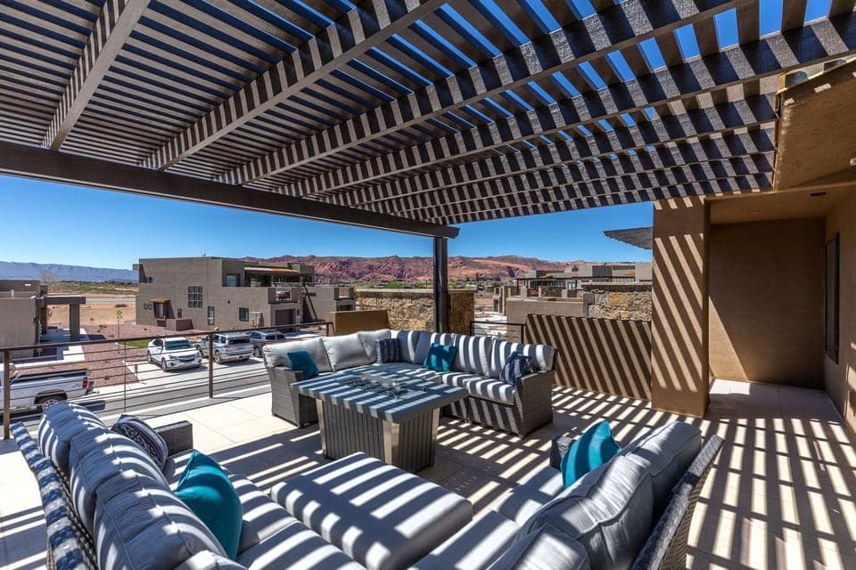 Upstairs Patio West View - The views from the upstairs patio are stunning.  You can enjoy majestic sandstone cliffs of Snow Canyon State Park directly from our home.