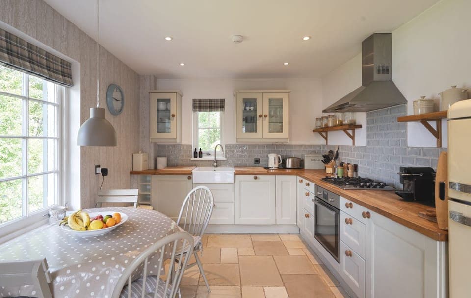 Large spacious modern kitchen with underfloor heating. Views to the Loch.