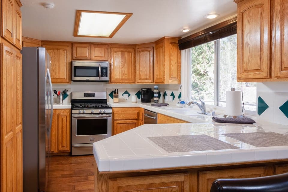 Enjoy a meal at the kitchen's counter-top dining area.   