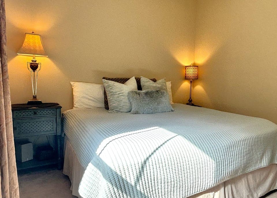 King bedroom also has a seating chair