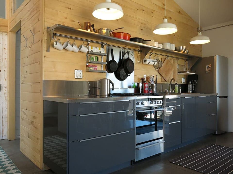 An open galley Kitchen has everything you need to cook your own meals. 