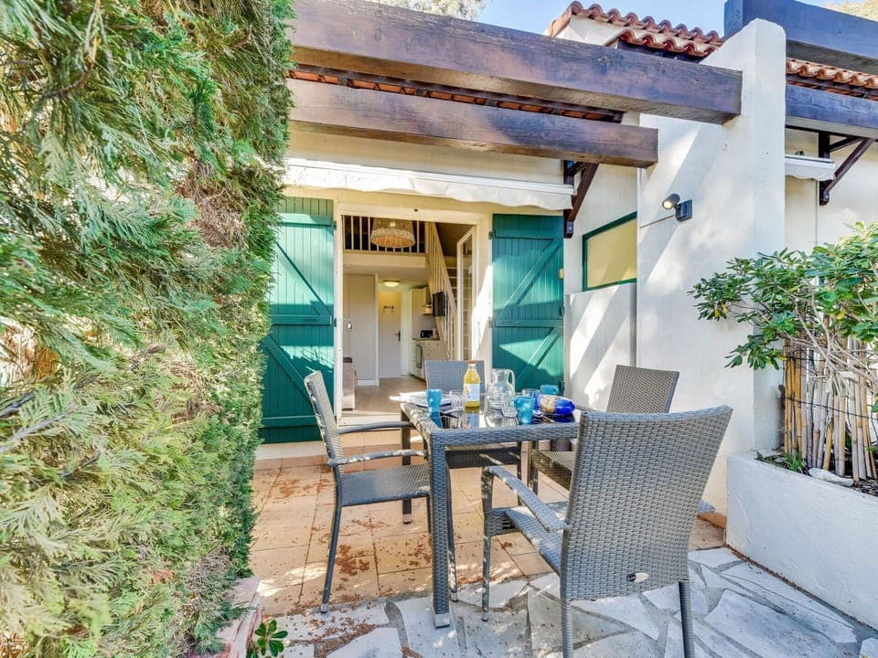 Plant, Furniture, Building, Property, Table, Flowerpot, Chair, Window, Outdoor Table, Outdoor Furniture