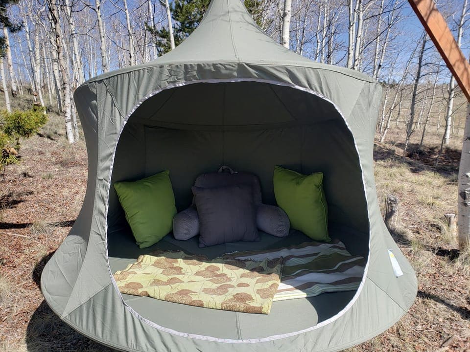Tree Cabana, great place to relax w/ a book. In backroom pls put away after use.
