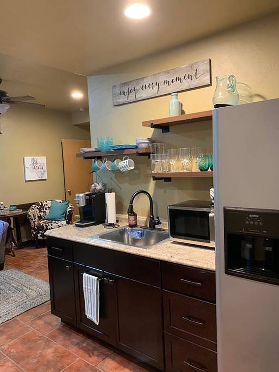 Kitchenette complete w/ Keurig coffee maker, microwave, refrigerator, ice maker.