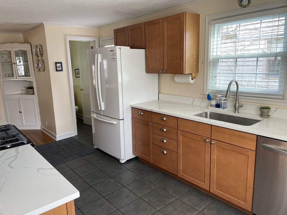 kitchen: dishwasher, new oven and microwave, quartz countertops. 